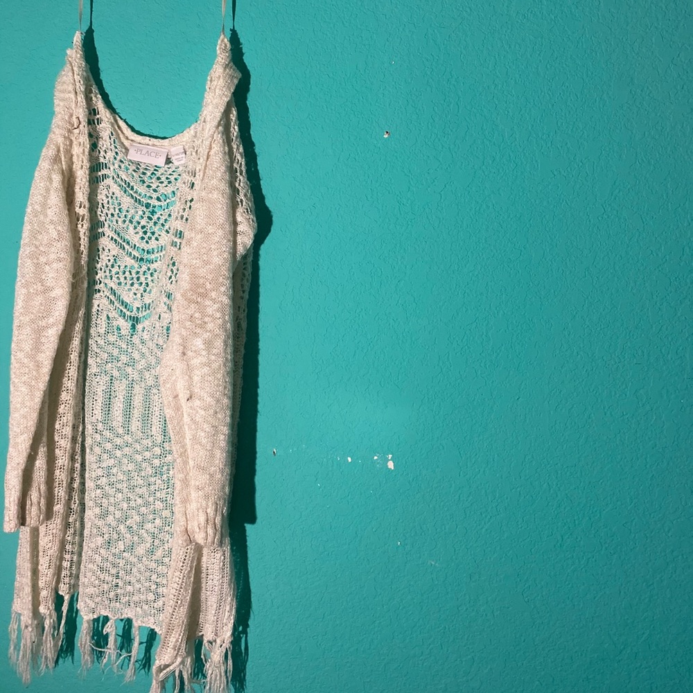 White cardigan with tassels